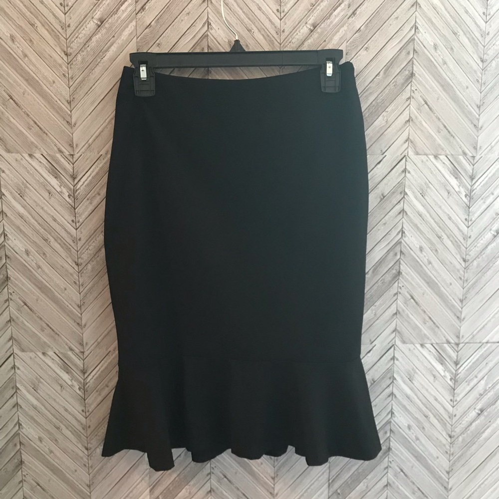The limited black pencil skirt w/ mermaid hem